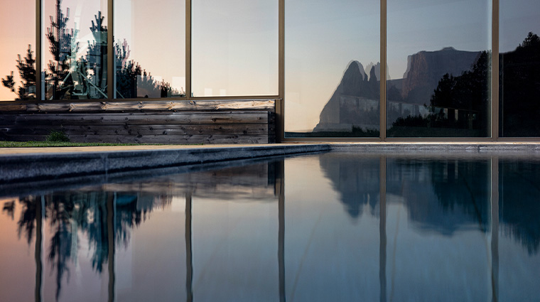 alpina dolomites exterior pool reflection