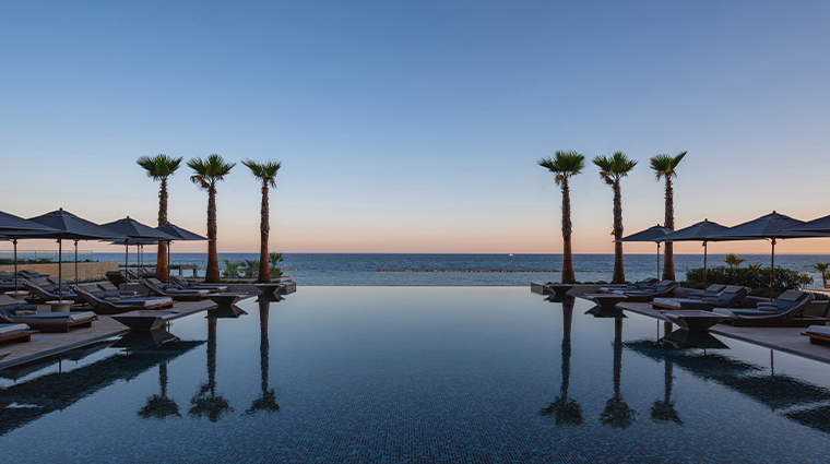 amara hotel cyprus Infinity edge pool sunset