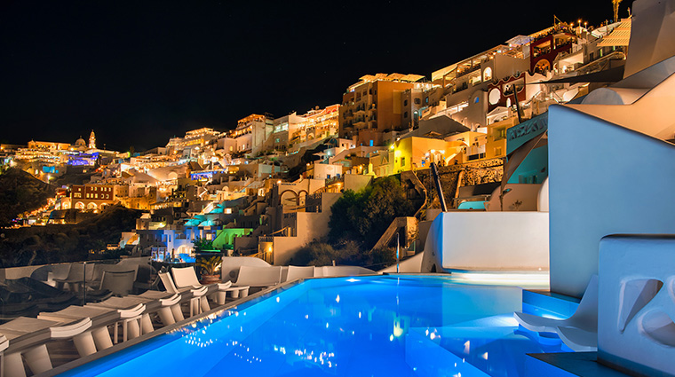 athina luxury suites night view pool
