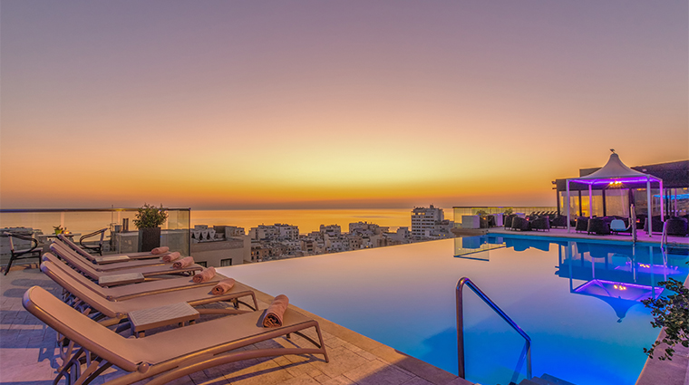 ax the palace infinity pool dusk