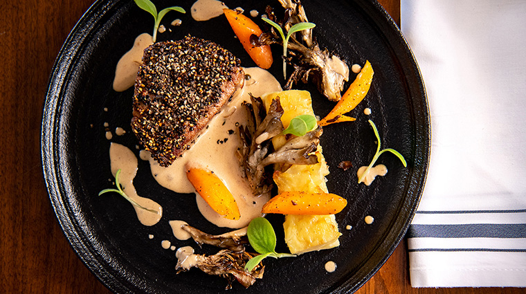 cafe du parc pepper crusted steak