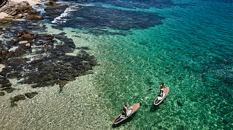 chileno bay resort residences auberge resorts collection experiences paddleboarding