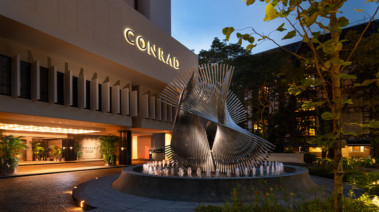 conrad singapore orchard driveway evening