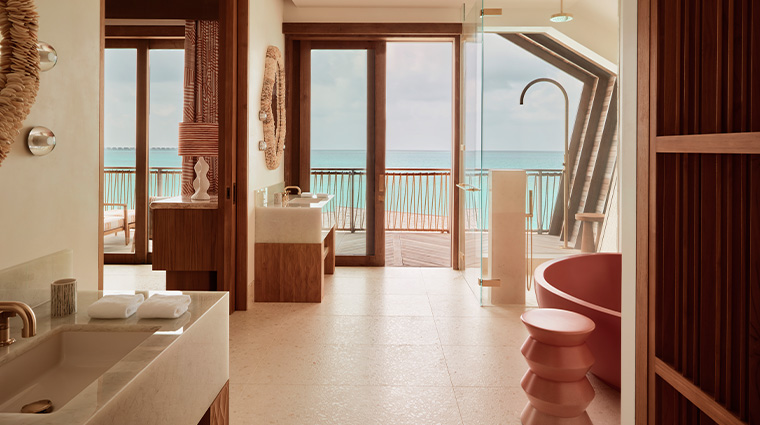 here baa atoll maldives four bedroom villa master bedroom2