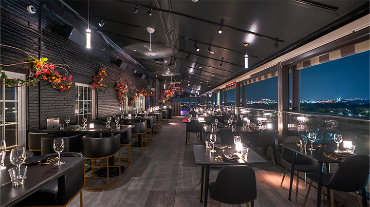 hotel washington vue rooftop dining area night