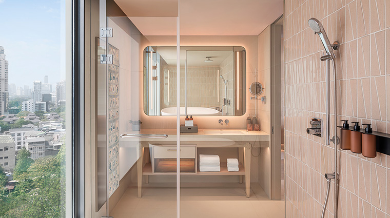 kromo bangkok curio collection by hilton corner junior suite bathroom