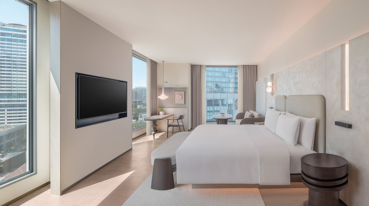 kromo bangkok curio collection by hilton corner junior suite bedroom2