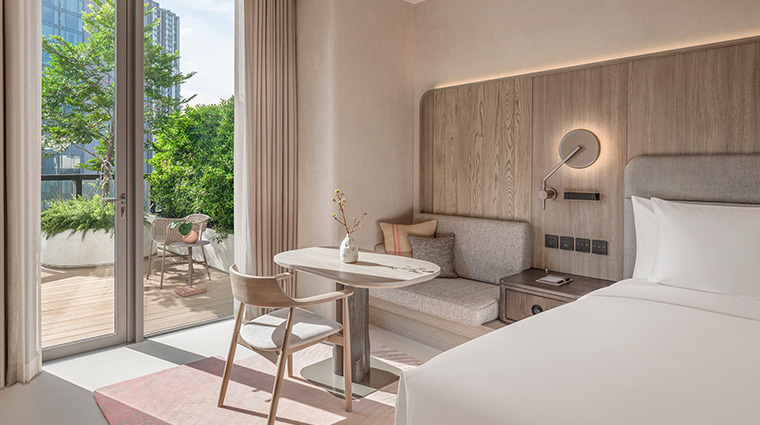 kromo bangkok curio collection by hilton premium terrace living room