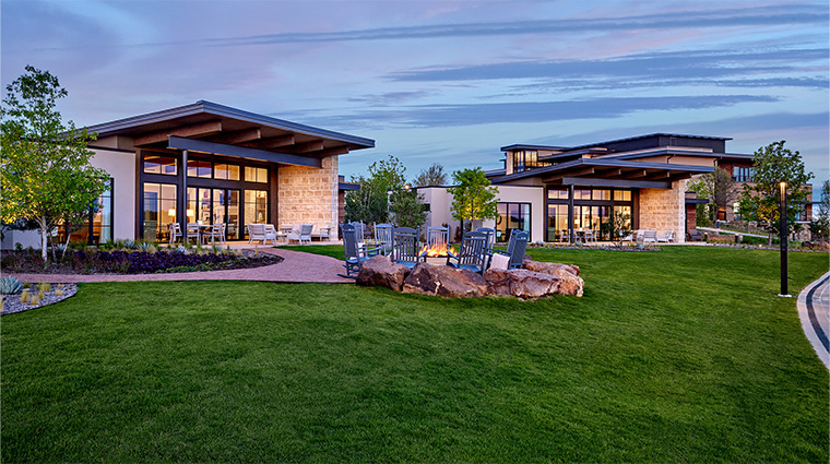 omni pga frisco resort ranch house exterior evening firepit