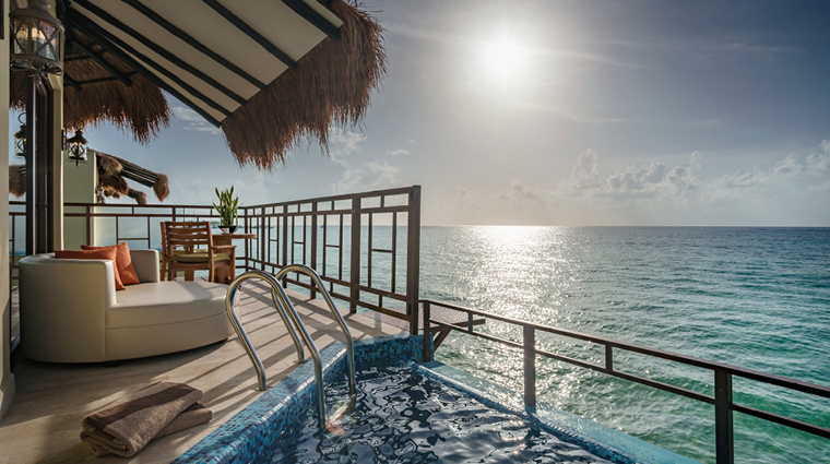 palafitos overwater bungalows patio with pool