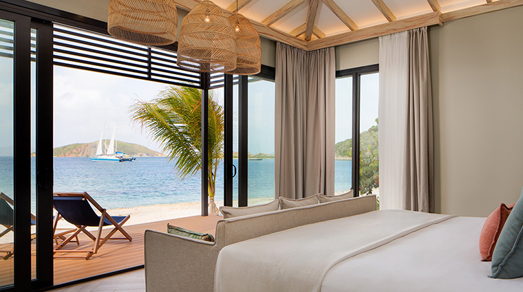 peter island resort beachfront bedroom