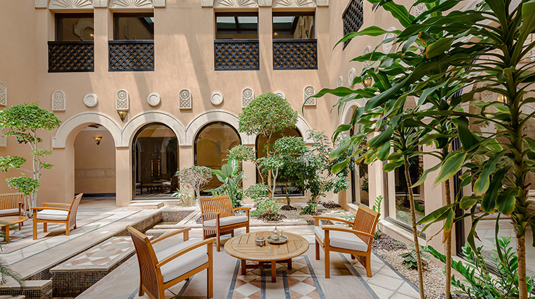 sharq village and spa a Ritz carlton hotel courtyard