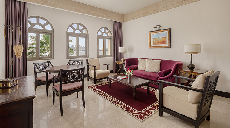 sharq village and spa a Ritz carlton hotel one bedroom suite living room