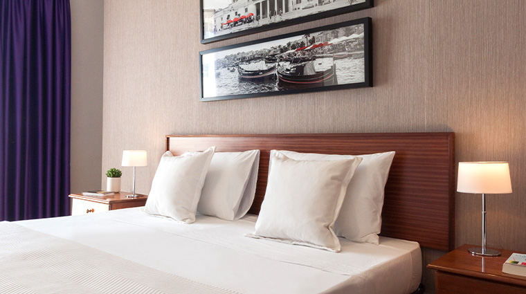 sliema hotel superior room bed