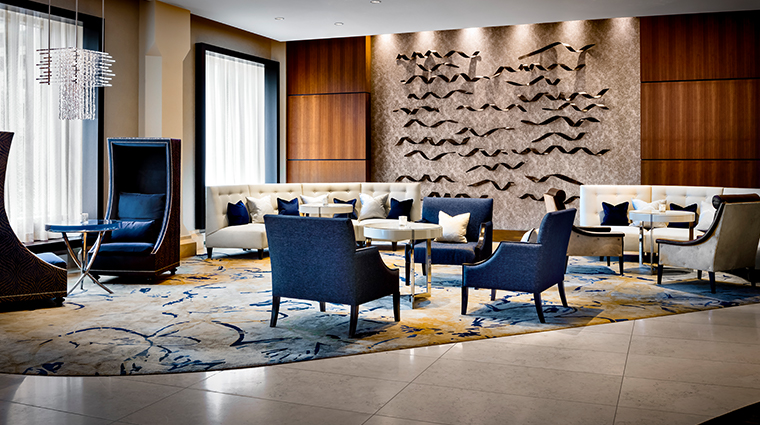 the gwen a luxury collection hotel lobby