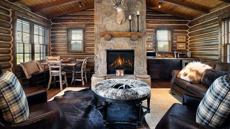 the lodge and spa at brush creek ranch private cabin living room2