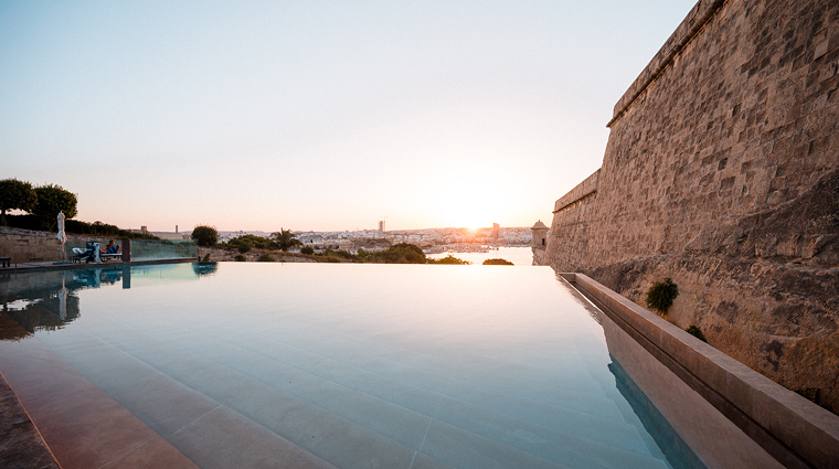 the phoenicia malta bastion pool sunset