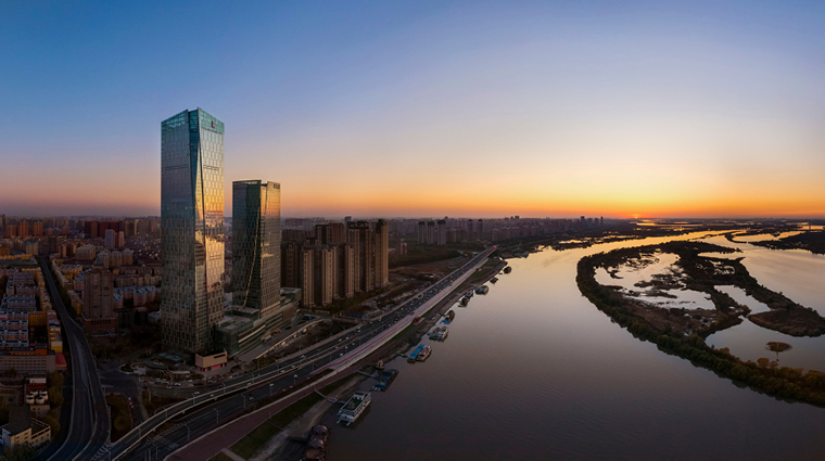 the ritz carlton harbin exterior sunset