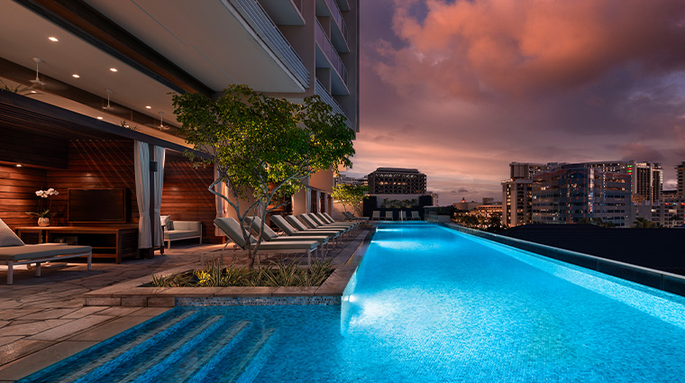 the ritz carlton residences waikiki beach adult pool evening