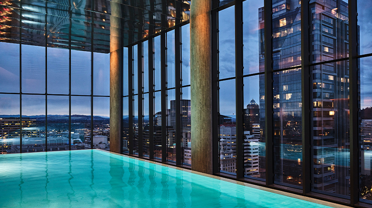 the ritz carlton portland hidden mountain lake indoor infinity edge pool evening