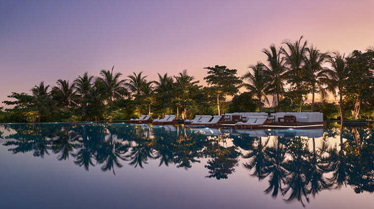 the riviera maya edition at kanai main pool sunset