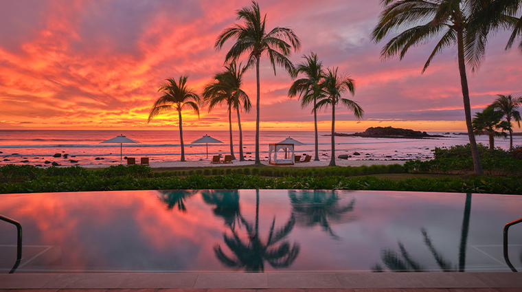 the st regis punta mita resort pool twilight