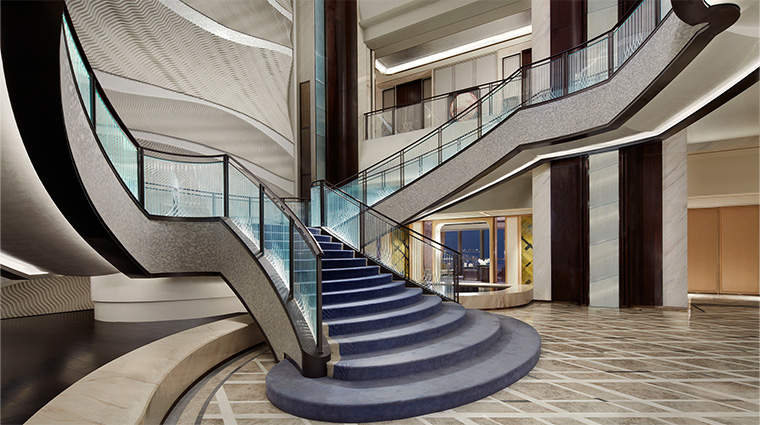 the st regis qingdao spiral staircase