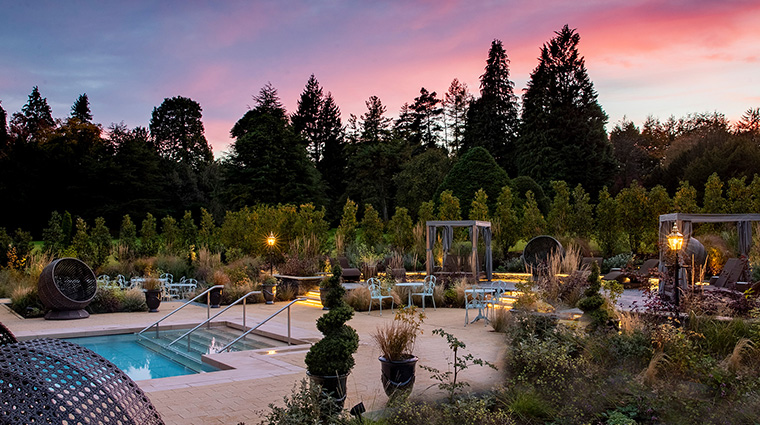 three graces spa at grantley hall outside pool at twilight