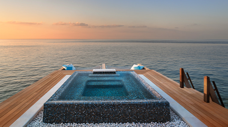 waldorf astoria maldives ithaafushi Overwater Villa Jacuzzi Dusk