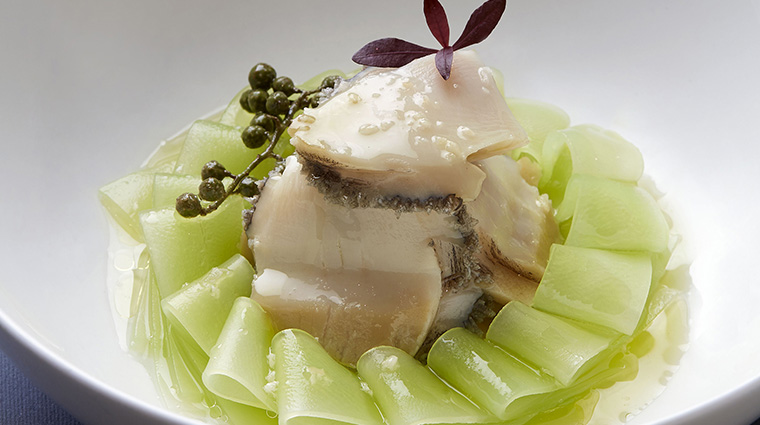 yi by jereme leung sliced south african abalone and vegetarian abalone stem lettuce